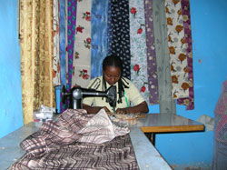 With funding for a small business, Tadeleu keeps busy with orders on her manually-powered sewing machine.