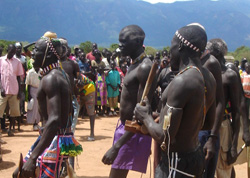 Community members participate in a traditional Murle dance in celebration of a successful peace meeting in Gurumuk.