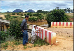 Workers in Madagascar protect roads and bridges from erosion.