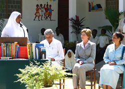 Photo of:A schoolgirl spoke to U.S. First Lady Laura Bush, Zanzibar First Lady Shadya Karume and Education Minister Haroun Ali Suleiman at the library inauguration.