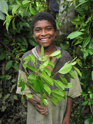 A young resident of Bajo Mira proudly displays the area’s rich habitat.