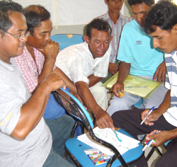 Villagers from the Kampuan village cluster in Thailand’s southern Ranong province meet and discuss their action plan for reviving coastal livelihoods destroyed by the December 2004 tsunami.