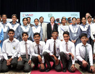 Islamabad, November 4, 2008 - USAID Mission Director Anne Aarnes with a group of Pakistani secondary school students who returned from the United States after participating in a two-week student exchange program.