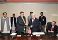Islamabad, October 24, 2008 – The Acting Deputy Administrator of USAID, James Kunder, and the Prime Minister’s Adviser on Economic Affairs, Shaukat Tarin, exchanging documents after signing six amendments totaling $341 million in bilateral agreements.