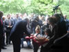 In accordance with Bulgarian tradition, U.S. Ambassador Beyrle receives bread to symbolize the start of a new venture