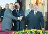 (From left) President Mesic, President Marovic and Chairman Paravac shake hands upon signing a joint statement on cooperation at the 10th Session of the Igman Initiative