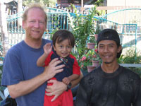 Guy Gelfenbaum says good-bye to some new friends on the survey team's last day in Banda Aceh. 