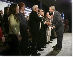 President George W. Bush greets audience members at the end of the Town Hall on Strengthening Social Security at the Tampa Convention Center in Tampa, Florida, Friday, Feb. 4, 2005.  White House photo by Eric Draper.