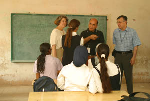 Iraqi school girls talk to USAID education advisors in a classroom of the  the Agadir Secondary school in the Saydiya neighborhood of Baghdad. USAID is looking at ways of updating the Iraqi school curriculum.