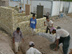 USAID partner, Save the Children, is working with community leaders to identify projects, both large and small, that will benefit the local community, including the Bab Taweel water project in the Abu Khaseeb district of Basra, Iraq. Iraqi laborers are building a wall around the equipment and a guard house to protect it from looters. When completed this pumping station will increase water pressure to approximately 15,000 local residents. The project was funded by community contributions ($11,000) and a grant from USAID ($29,000).