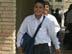 A student from the Zein Al Abdeen secondary boy's school in the Amil district of Baghdad leaves school after classes with his new school bag which contains, pens, pencils, notebooks, a calculator and other school supplies. USAID is funding the purchase and distribution of 1.5 million of the bags through a contract with Creative Associates International. All Iraqi secondary students will receive the bags.