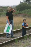 Young visitor gets sidetracked by the railroad line adjacent to the Pacific Science Center