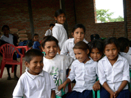 Children in Bolivia gather after receiving USAID-funded relief supplies.