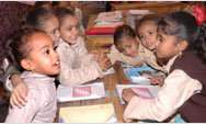 At this primary school in Komombo, Egypt, scholarships as well as community outreach enable girls like Shaymaa (front left) to join the classroom once again - Click to read this story