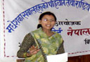 A woman discusses issues of concern to the Madhesi people at a workshop.