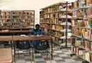 Photo: A professor interacts with students in the Juba lecture hall.