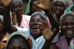 Photo: Women celebrating the passage of a law protecting their rights.