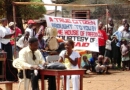 Photo: House of Freedom's drama troupe performs the GEMAP drama for a crowd in Monrovia.