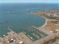 aerial photo of Crescent City Harbor showing interior yacht basin