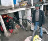 Djemailj Jahiri next to his new moto-cultivator