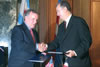 Mayor Daley (left) and Mayor Bogdanovic (right) shake hands after signing the Sister City Agreement