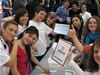 USAID volunteers working during the education rendezvous at the USAID booth; Starting from the left: Marina Atanasovska, Linda Zejneli, Aleksandra Angelova, Emilija Zaevskaa, Simona Stankovska, Aleksandra Gadzeva, Leonida Penka Basha, Ana Velickovska - students from different high-schools, Skopje