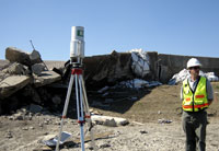 Rob Kayen and lidar unit near the southern levee breach on the Inner Harbor Navigation Canal.