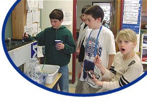 Photo of young students testing samples in a classroom laboratory - Photo credit:  U.S. Fish and Wildlife Service