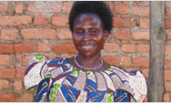 Suzie Cici sells smoked fish at a market in Yei, Southern Sudan - Click to read this story