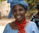 Wearing a garland of red HIV-awareness ribbons, part of a caravan crossing the Sahel region to spread HIV-prevention messages