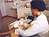 Photo of a nurse taking a blood sample at a voluntary counseling and testing center