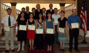 The 2006 Parliamentary interns pose with U.S. Ambassador John Tefft (back center), Parliamentary Strengthening Manager Jim Hart and NDI Country Representative Mike Kelleher (back right) at the July graduation ceremony