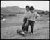 Photo: Pochua Yang caught his sons, Lou and Sou, rolling an unexploded bomb with their feet. The boys, ages 6 and 7, were bringing the bomb to a scrap metal dealer. Pochua and his sons live in Phonsavan, Laos.