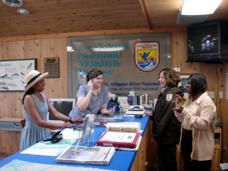 Conversation between guests and staff at the Visitor Center