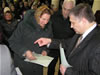 Kyiv Oblast Governor Y. Zhovtiak issues State Act during titling ceremony in March 2006. More than one million Ukrainian villagers have received ownership of land plots through USAID support