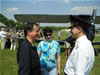 Larissa Kazachenko, with her husband (right) and Mr. Maxi Gainza, a member of the elite British Air Squadron Club, during the Crimea vintage planes exhibition, as a part of 150th anniversary of the Crimean War commemoration (2005)