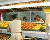 A Rukavychka customer picks fresh produce