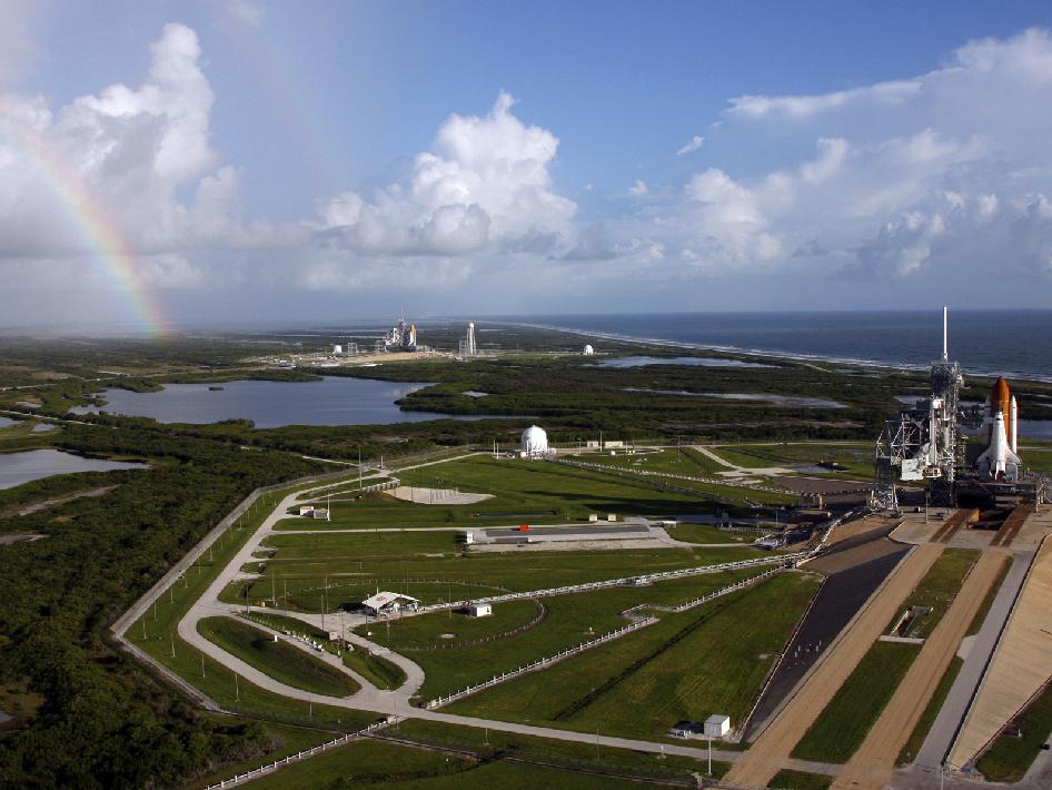 Space shuttles Endeavour and Atlantis on the launch pads.