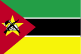 Mozambique flag is three equal horizontal bands of green (top), black, and yellow with a red isosceles triangle based on the hoist side; the black band is edged in white; centered in the triangle is a yellow five-pointed star bearing a crossed rifle and hoe in black superimposed on an open white book.