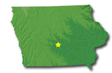 Image of Iowa with a star pinpointing the location of the capital.