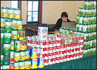 Stacks of canned food donations form a wall in the IMU