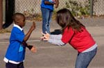 A Brookland Elementary School student and a Sports4Kids staff member demonstrate the Sports4Kids method of settling a dispute—by using the children’s game Rock, Paper, Scissors. Geared to making sure that school children have time during the day for healthy play, Rescuing Recess is an initiative led by the Cartoon Network and supported by the National Basketball Association. The Corporation for National and Community Service is one of several partners in the effort, which recognizes that providing children with time for physical activity can lead to greater academic achievement while fighting the problem of childhood obesity.