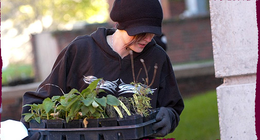 Picture of an Augsburg student participating in an environmental studies lesson.