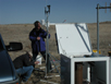 Installation of a meteorological station at a northern High Plains rangeland site.