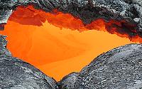 Meandering lava seen through 1880-foot skylight, Kilauea volcano, Hawai'i.