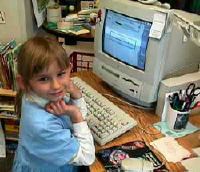 Young elementary girl in front of computer