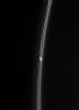 The Cassini spacecraft spies an intriguing bright clump in Saturn's F ring. Also of interest is the dark gash that appears to cut through the ring immediately below the clump