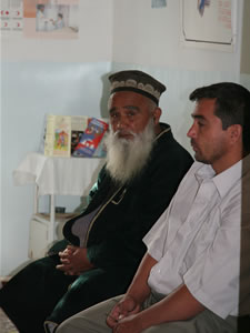 Thousands of Tajiks, like this man (left), receive TB DOTS treatment from USAID-supported health facilities