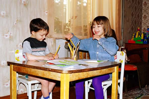 Children play at an ARO sponsored care center