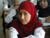 A student from the Hala Bint Khuwaylid secondary girl's school in the Amil district of Baghdad attends a class in the refurbished scdhool. USAID funded the renovation of 1260 schools throughout Iraq in time for the start of school in October 2003.